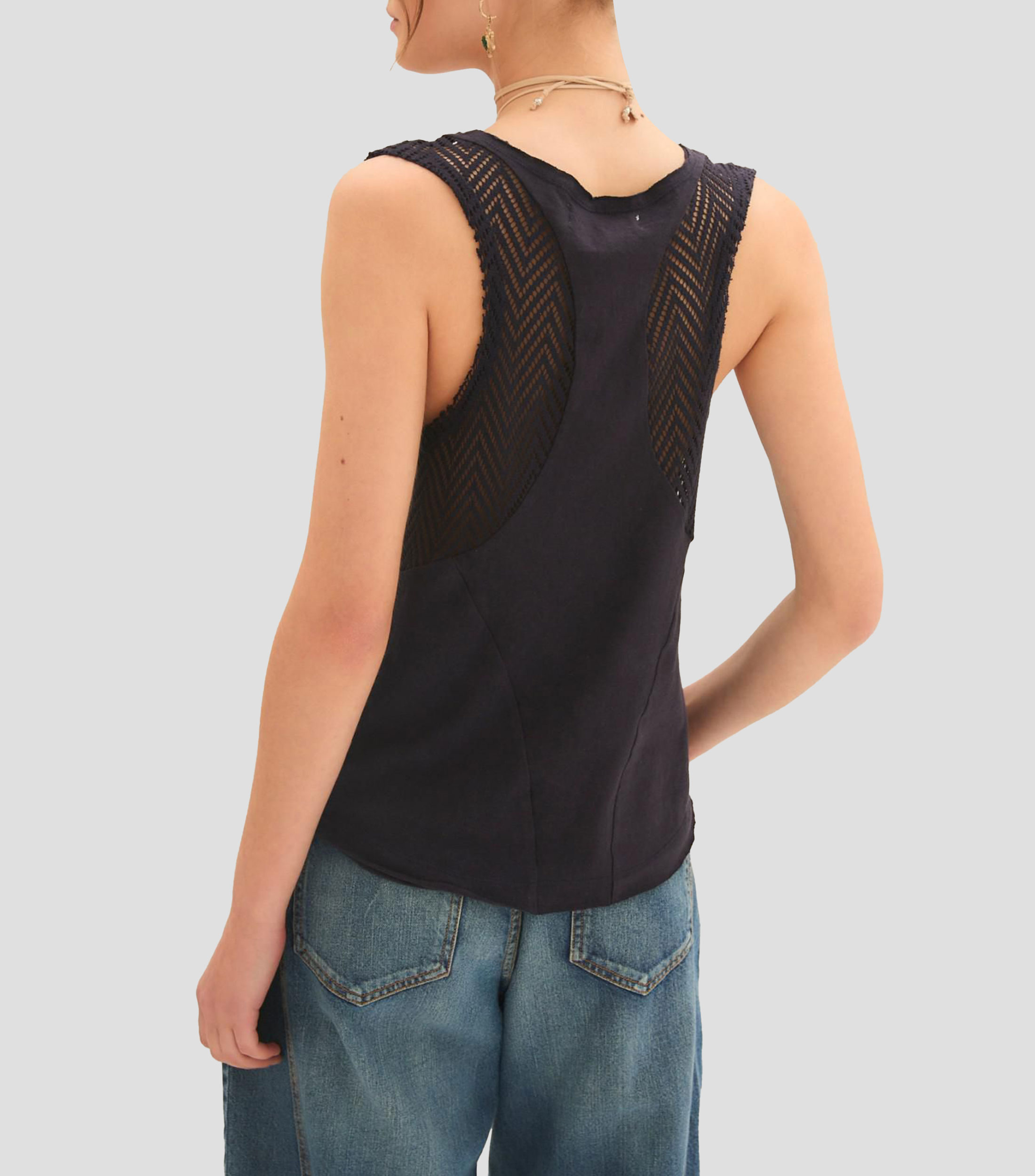 Blusa lisa sin mangas Mujer